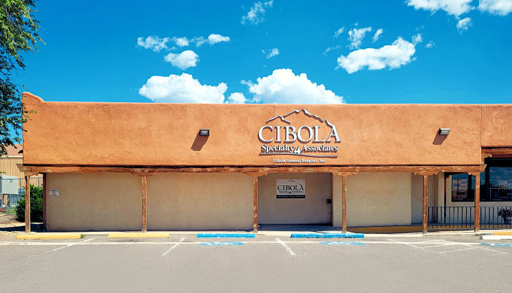 Exterior view of the Cibola Specialty Associates building entrance and parking lot